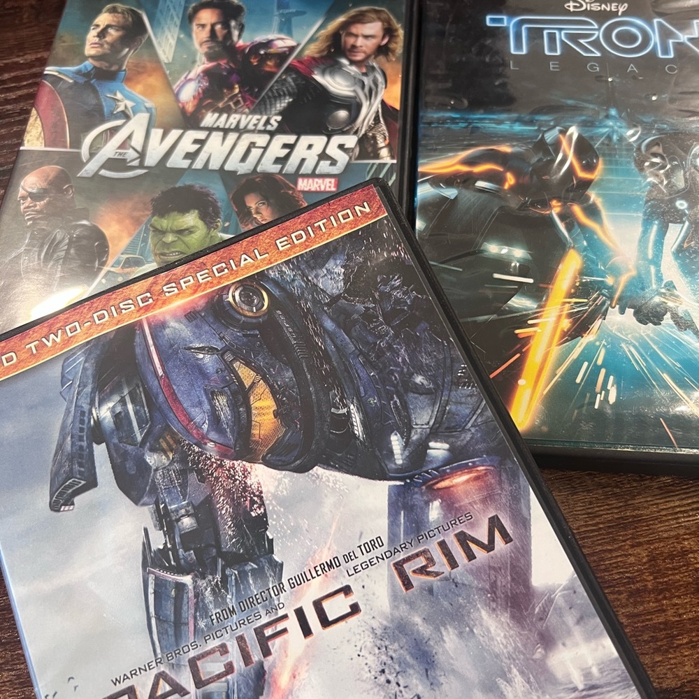 Pacific Rim, Tron, and Avengers DVDs